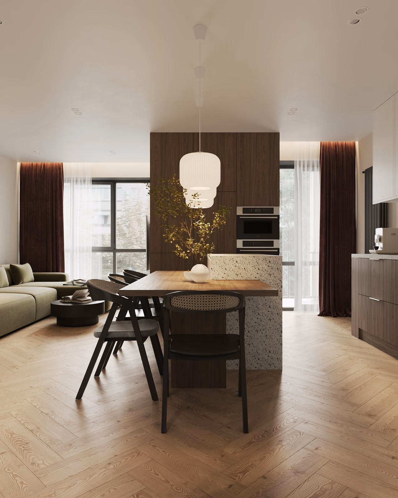 Salón y cocina abiertos tras una reforma integral, con suelo de madera en espiga